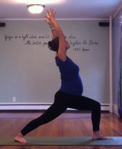 Me in Virabhadrasana A during the third trimester of my first pregnancy.